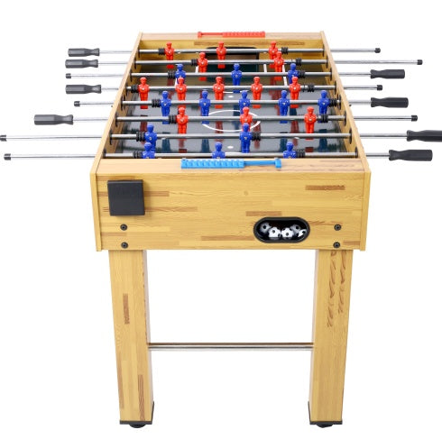 Foosball table with wooden finish and red, blue, and white figures on a white background