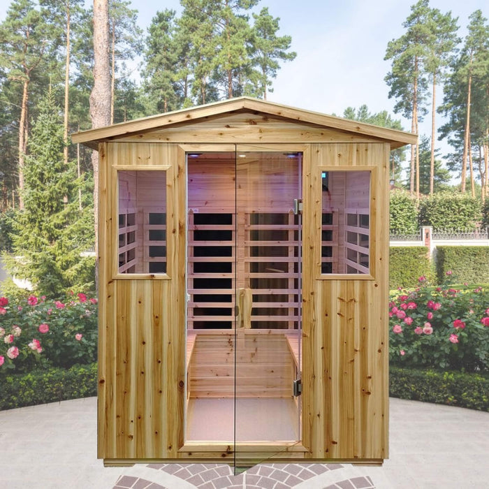 Wooden sauna with glass doors in a garden setting with flowers and trees.