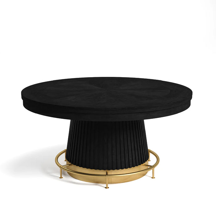 Round black table with a gold base on a white background