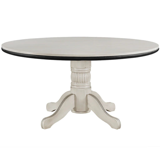 Round dining table with a white base and black top on a white background