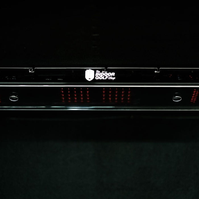 Black electronic device with visible branding on a black background