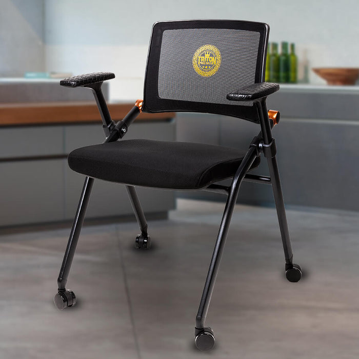 Black office chair with a logo on the backrest in an indoor setting