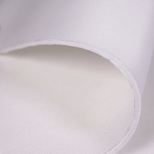 Close-up of a white fabric with a subtle texture on a light gray background