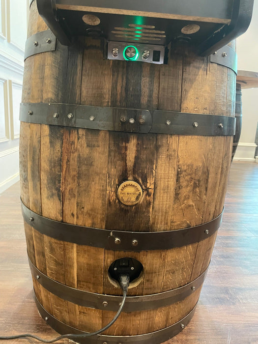 Wooden barrel with electronic components on top