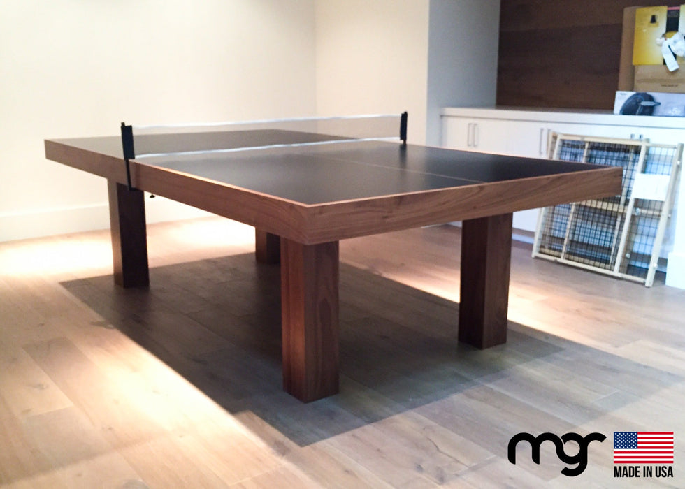 Wooden ping pong table with MGR branding in a room setting