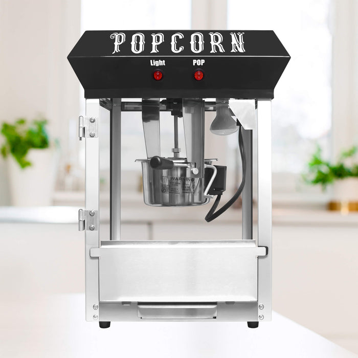 Popcorn machine with a black top labeled 'Popcorn' on a white background.