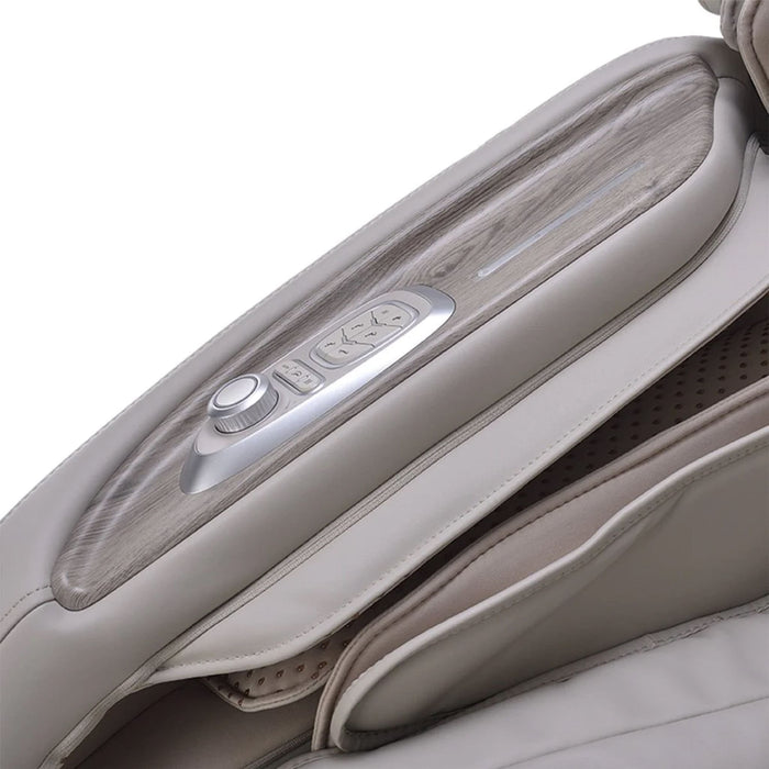 Close-up of a massage chair's control panel with buttons and a knob on a white background