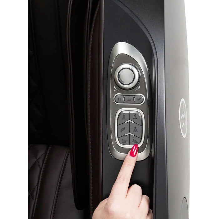 Hand pressing a car door control panel with a finger