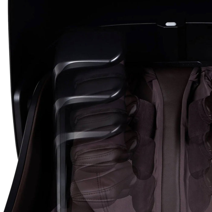 Close-up of a massage chair with black leather and metallic armrests on a white background
