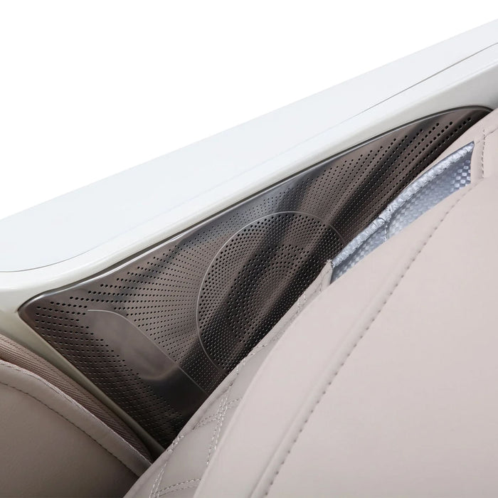 Car interior with a perforated black panel on a beige seat