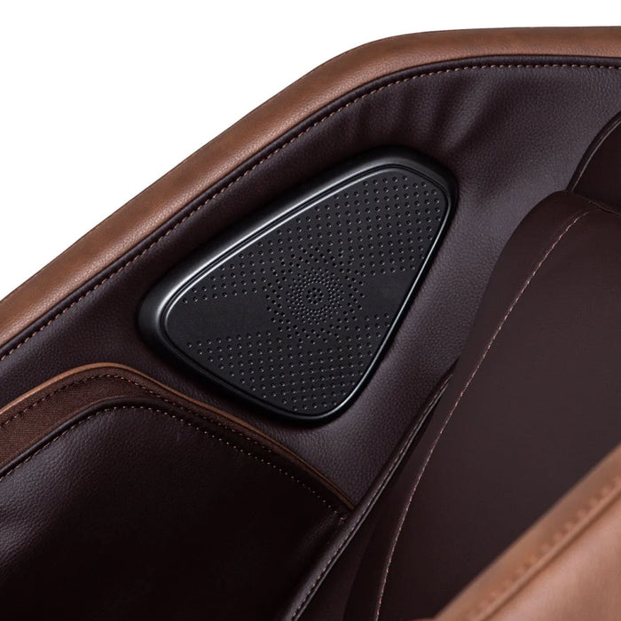 Brown leather massage chair with a black control panel