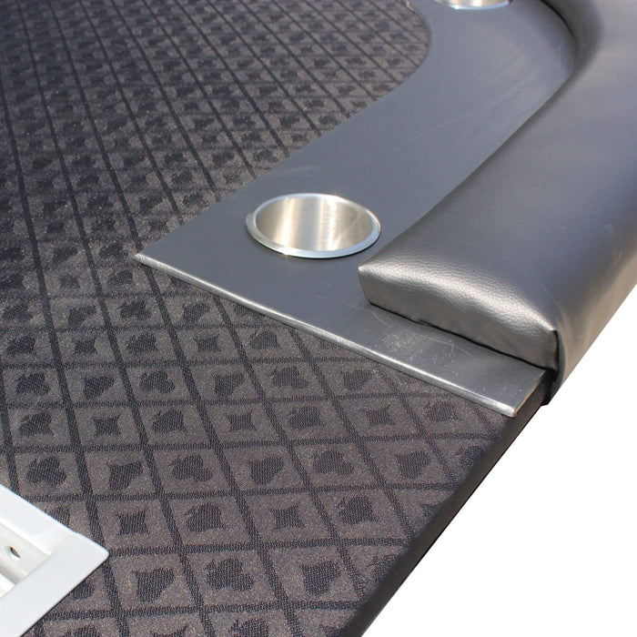Close up of poker table with black speed cloth, padded armrest, and metal cup holder