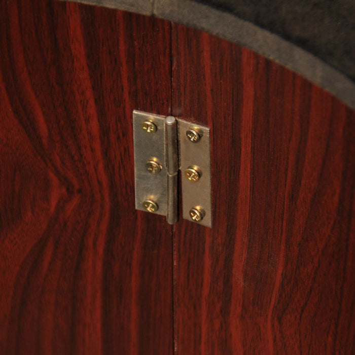 Close-up of a wooden door with a metal hinge