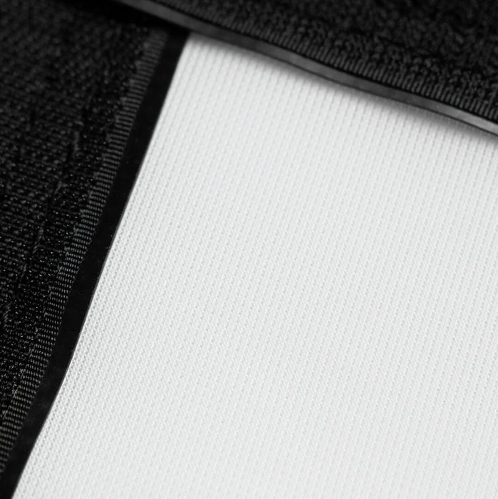 Close-up of a black fabric texture on a white background