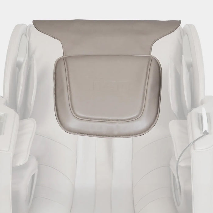 Gray massage pillow on a white massage chair