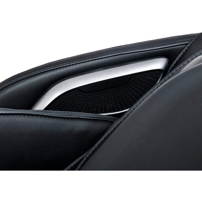 Close-up of a car's interior door panel with a silver handle on a white background