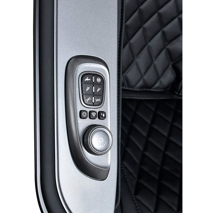 Car door control panel with buttons and a knob on a quilted black leather interior.