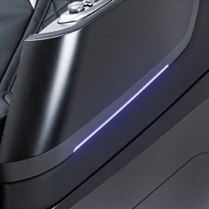 Close-up of a car door with a metallic handle and blue light strip.
