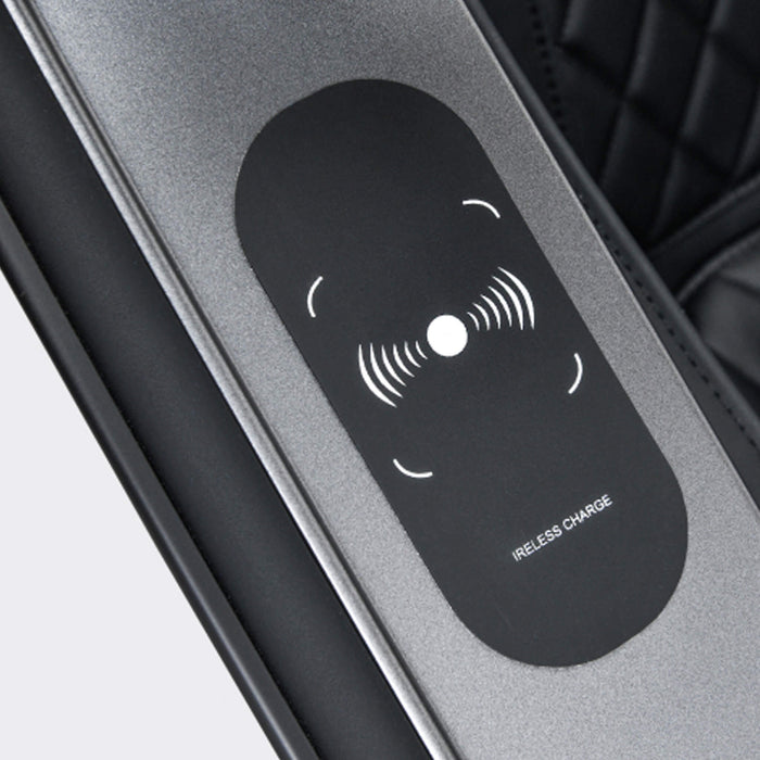 Wireless charging pad on a car's door panel with 'Wireless Charge' text.