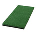 Green artificial grass mat on a white background