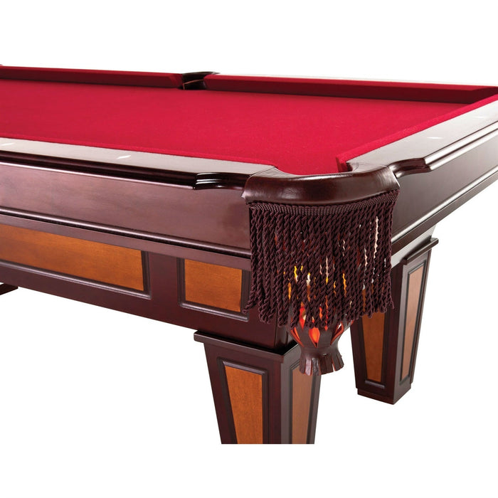 Wooden pool table with red felt surface on a white background