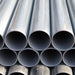 Stack of metal pipes with a close-up view
