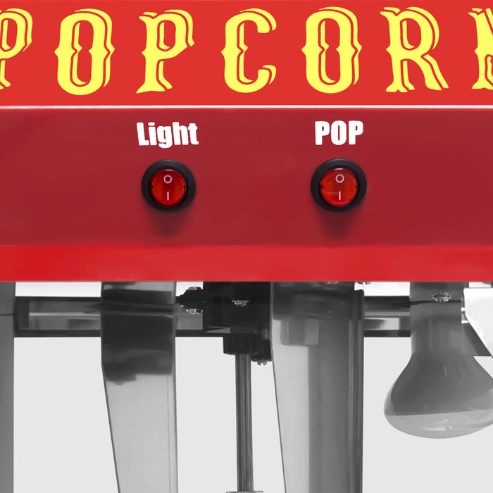 Red popcorn machine with 'Popcorn' text and control buttons on a white background