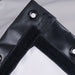 Close-up of a black corner bracket with grommets on a white background