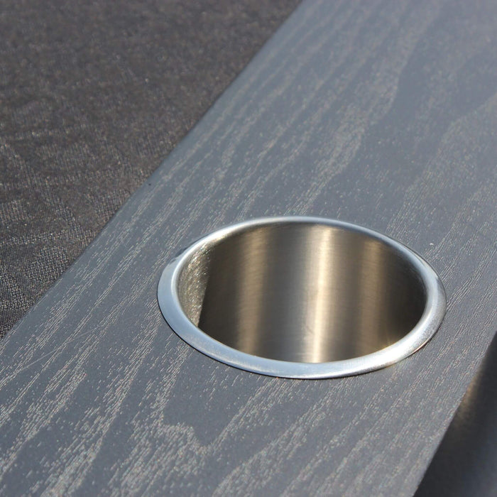 Metallic circular inset on a textured gray surface