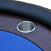 Close-up of a metallic sink drain on a wooden surface with a blue corner.